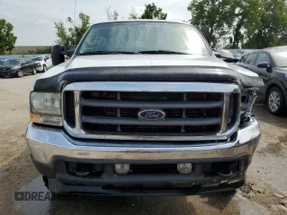 2004 Ford Super Duty F-250 XL with VIN 1FTNW21P14EA23582, listed as a Copart auction lot 62658954 with 205,382 mi miles and Salvage Title. Bid and sale history available at carsss.com. Image 5.