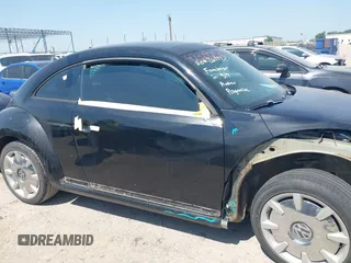 2013 Volkswagen Beetle 2.5L with VIN 3VWHX7AT3DM603962, listed as a IAAI auction lot 42329256 with 137,285 mi miles and . Bid and sale history available at DreamBid. Image 13.