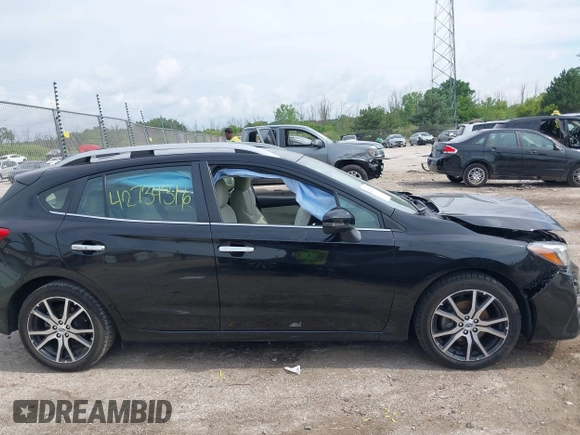 2019 Subaru Impreza Limited z VIN 4S3GTAT61K3705645, wystawiony jako IAAI lot #42734316 z przebiegiem 42 704 mil mil oraz . Historia ofert i sprzedaży dostępna na DreamBid. Obrazek 13.