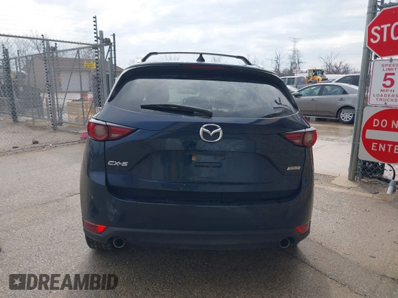 2018 Mazda CX-5 Grand Touring with VIN JM3KFADM1J1439544, listed as a IAAI auction lot 41891134 with 54,132 mi miles and . Bid and sale history available at DreamBid. Image 16.