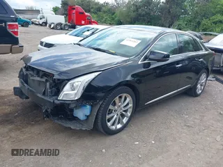 2013 Cadillac XTS Luxury with VIN 2G61R5S32D9246125, listed as a IAAI auction lot 42261263 with 89,390 mi miles and . Bid and sale history available at DreamBid. Image 19.