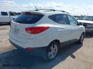 2013 Hyundai Tucson GLS with VIN KM8JU3AC9DU591992, listed as a IAAI auction lot 42095819 with 181,206 mi miles. Bid and sale history available at carsss.com. Image 4.