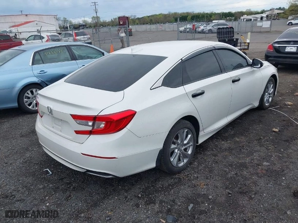 2019 Honda Accord Sedan LX 1.5T with VIN 1HGCV1F14KA169683, listed as a IAAI auction lot 41950933 with 77,628 mi miles. Bid and sale history available at carsss.com. Image 4.