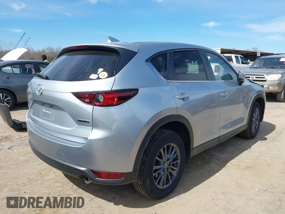 2020 Mazda CX-5 Touring with VIN JM3KFBCM3L0791816, listed as a IAAI auction lot 41761623 with 87,742 mi miles and . Bid and sale history available at carsss.com. Image 4.
