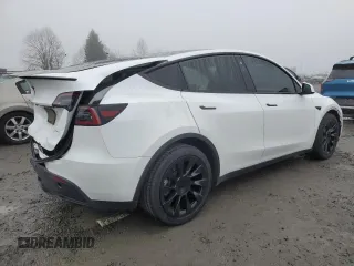 2021 Tesla Model Y Long Range with VIN 5YJYGDEE1MF267004, listed as a Copart auction lot 88708485 with 65,669 mi miles and Salvage Title. Bid and sale history available at DreamBid. Image 3.