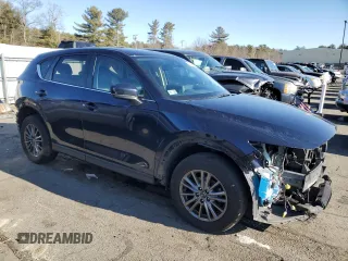 2021 Mazda CX-5 Touring with VIN JM3KFBCM1M1370592, listed as a Copart auction lot 87175264 with 81,193 mi miles and Salvage Title. Bid and sale history available at carsss.com. Image 4.