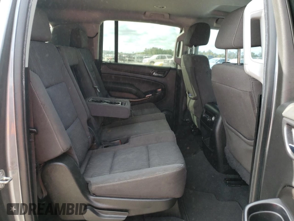 2020 Chevrolet Suburban LS z VIN 1GNSCGKC0LR178627, wystawiony jako Copart lot #75691803 z przebiegiem 60 978 mil mil oraz Szkoda całkowita • Salvage title. Historia ofert i sprzedaży dostępna na DreamBid. Obrazek 11.