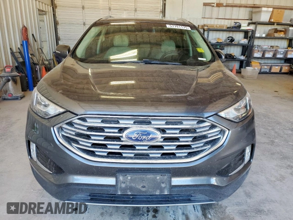 2019 Ford Edge SEL z VIN 2FMPK3J96KBC72783, wystawiony jako Copart lot #57761175 z przebiegiem 153 590 mil mil oraz Czysty tytuł • Clean title. Historia ofert i sprzedaży dostępna na DreamBid. Obrazek 5.
