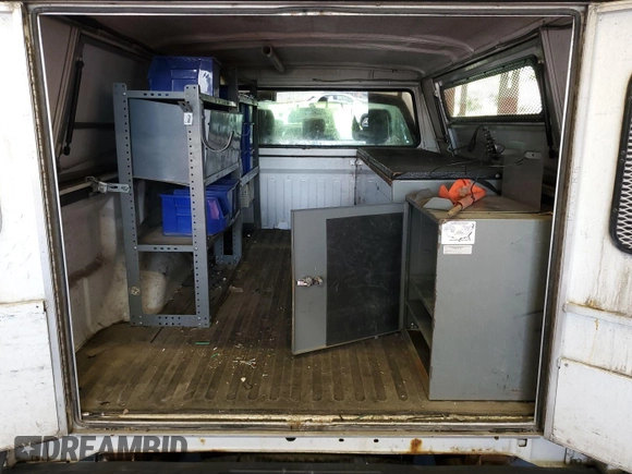 2013 Ford F-150 XL with VIN 1FTMF1EM0DKE77412, listed as a IAAI auction lot 42631346 with 197,770 mi miles and . Bid and sale history available at DreamBid. Image 8.