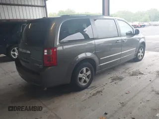 2010 Dodge Grand Caravan SXT z VIN 2D4RN5D11AR220105, wystawiony jako IAAI lot #42299610 z przebiegiem 223 842 mil mil oraz . Historia ofert i sprzedaży dostępna na DreamBid. Obrazek 4.
