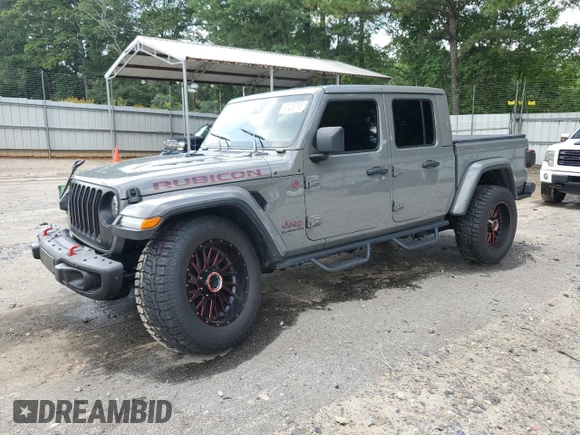 2021 Jeep Gladiator Rubicon с VIN 1C6JJTBG5ML507579, выставлен на аукционе Copart как лот 60409785 с пробегом 62 585 миль миль и Списание • Salvage title. История ставок и продаж доступна на DreamBid. Изображение 1.