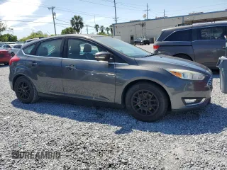 2015 Ford Focus Titanium with VIN 1FADP3N24FL260486, listed as a Copart auction lot 49856865 with Not provided miles and Clean title. Bid and sale history available at DreamBid. Image 4.
