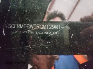 2024 Aston Martin DB12 z VIN SCFRMFGW5RGM12901, wystawiony jako Copart lot #64941574 z przebiegiem Nie podano mil oraz Nie do naprawy. Historia ofert i sprzedaży dostępna na DreamBid. Obrazek 12.