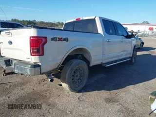 2016 Ford F-150 XLT with VIN 1FTFW1EF4GFA70555, listed as a IAAI auction lot 41733971 with 218,209 mi miles. Bid and sale history available at carsss.com. Image 4.