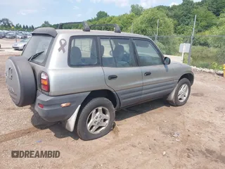 1999 Toyota RAV4 with VIN JT3HP10VXX7117364, listed as a IAAI auction lot 42720348 with 162,598 mi miles and . Bid and sale history available at DreamBid. Image 4.