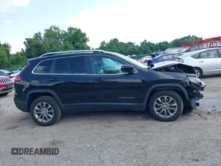 2019 Jeep Cherokee Latitude Plus z VIN 1C4PJLLB5KD316077, wystawiony jako IAAI lot #42723693 z przebiegiem 103 758 mil mil oraz . Historia ofert i sprzedaży dostępna na DreamBid. Obrazek 14.
