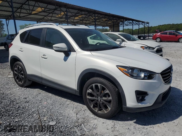 2016 Mazda CX-5 Grand Touring with VIN JM3KE4DY0G0819528, listed as a Copart auction lot 52343885 with 77,340 mi miles and Clean Title. Bid and sale history available at DreamBid. Image 4.