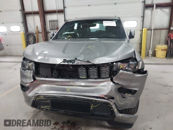 2018 Jeep Grand Cherokee Laredo E with VIN 1C4RJFAG6JC102969, listed as a IAAI auction lot 41963137 with 112,361 mi miles and . Bid and sale history available at DreamBid. Image 12.