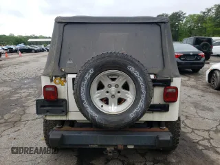 2005 Jeep Wrangler Sport z VIN 1J4FA49S55P334844, wystawiony jako Copart lot #52026835 z przebiegiem 209 216 mil mil oraz Czysty tytuł • Clean title. Historia ofert i sprzedaży dostępna na DreamBid. Obrazek 6.
