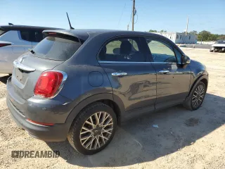 2018 FIAT 500X Lounge with VIN ZFBCFXDB5JP664130, listed as a Copart auction lot 73784574 with 67,160 mi miles and Salvage title. Bid and sale history available at DreamBid. Image 3.