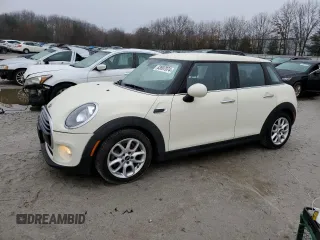 2018 MINI Hardtop 4 Door Cooper with VIN WMWXU1C58J2F79650, listed as a Copart auction lot 83897074 with 52,319 mi miles and Salvage Title. Bid and sale history available at DreamBid. Image 1.