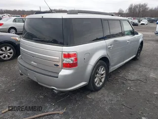 2016 Ford Flex SE with VIN 2FMGK5B80GBA12646, listed as a IAAI auction lot 41141786 with 100,000 mi miles. Bid and sale history available at carsss.com. Image 4.