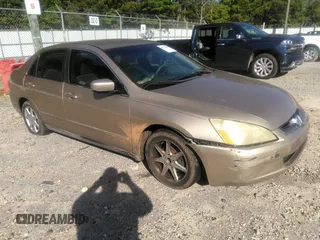 2005 Honda Accord LX with VIN 1HGCM56465A153977, listed as a IAAI auction lot 42716986 with 316,431 mi miles and . Bid and sale history available at DreamBid. Image 1.
