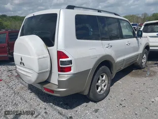 2002 Mitsubishi Montero LTD with VIN JA4MW51RX2J004459, listed as a IAAI auction lot 41963113 with 212,764 mi miles. Bid and sale history available at carsss.com. Image 6.