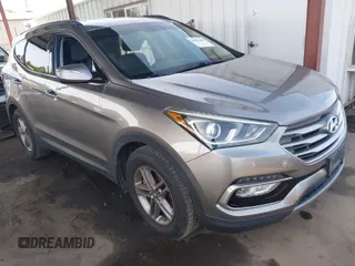 2017 Hyundai Santa Fe 2.4L z VIN 5NMZU3LB9HH014887, wystawiony jako IAAI lot #41901661 z przebiegiem 62 718 mil mil oraz . Historia ofert i sprzedaży dostępna na DreamBid. Obrazek 1.