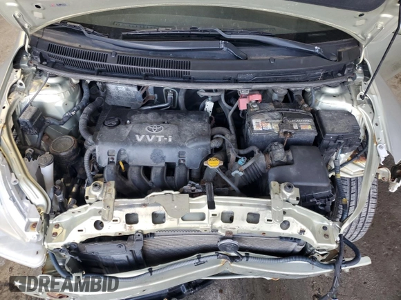 2008 Toyota Yaris z VIN JTDBT923381274987, wystawiony jako Copart lot #52081485 z przebiegiem 188 017 mil mil oraz Szkoda całkowita • Salvage title. Historia ofert i sprzedaży dostępna na DreamBid. Obrazek 11.