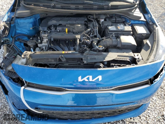 2023 Kia Rio S z VIN 3KPA24AD2PE529734, wystawiony jako Copart lot #48755585 z przebiegiem 99 031 mil mil oraz Szkody całkowita. Historia ofert i sprzedaży dostępna na DreamBid. Obrazek 12.