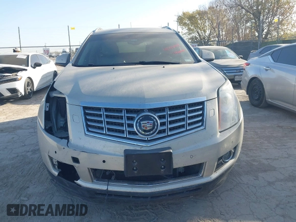 2014 Cadillac SRX Premium Collection with VIN 3GYFNDE37ES574109, listed as a IAAI auction lot 41770404 with 66,478 mi miles and . Bid and sale history available at DreamBid. Image 12.