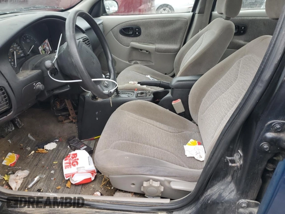 2000 Saturn SL with VIN 1G8ZK5276YZ238736, listed as a Copart auction lot 80936244 with 94,560 mi miles and Salvage title. Bid and sale history available at DreamBid. Image 7.