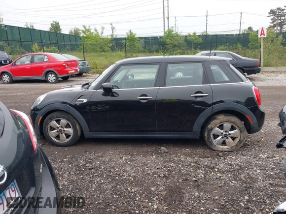 2020 MINI Hardtop 4 Door Cooper with VIN WMWXU7C04L2L58635, listed as a IAAI auction lot 42383785 with 27,160 mi miles and . Bid and sale history available at DreamBid. Image 14.