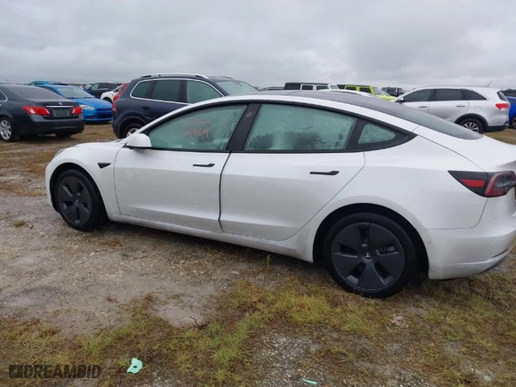 2022 Tesla Model 3 Long Range with VIN 5YJ3E1EBXNF267363, listed as a IAAI auction lot 40494604 with NaN miles. Bid and sale history available at carsss.com. Image 14.