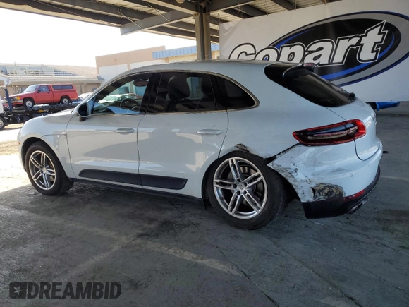2016 Porsche Macan S with VIN WP1AB2A5XGLB48328, listed as a Copart auction lot 55897815 with 73,558 mi miles and Salvage title. Bid and sale history available at DreamBid. Image 2.