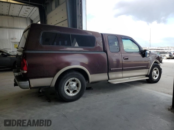 2001 Ford F-150 XL with VIN 1FTRX17W71NA45086, listed as a Copart auction lot 54182945 with 173,998 mi miles and Salvage title. Bid and sale history available at DreamBid. Image 3.