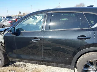 2021 Mazda CX-5 Grand Touring with VIN JM3KFBDM0M0468081, listed as a IAAI auction lot 41894411 with 54,664 mi miles. Bid and sale history available at carsss.com. Image 15.