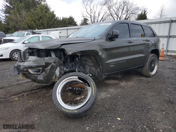2016 Jeep Grand Cherokee Limited 75th Anniversary with VIN 1C4RJFBG5GC441102, listed as a Copart auction lot 87450344 with 130,811 mi miles and Salvage Title. Bid and sale history available at carsss.com. Image 1.