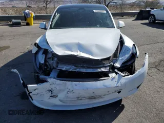 2025 Tesla Model Y Long Range with VIN 7SAYGDED2SA373756, listed as a Copart auction lot 49866835 with 3,318 mi miles and Salvage Title. Bid and sale history available at DreamBid. Image 5.