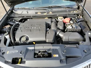 2016 Lincoln MKS с VIN 1LNHL9DK0GG601111, выставлен на аукционе Copart как лот 88354865 с пробегом 96 298 миль миль и Списание • Salvage title. История ставок и продаж доступна на DreamBid. Изображение 13.