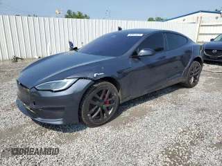 2023 Tesla Model S Plaid с VIN 5YJSA1E61PF518977, выставлен на аукционе Copart как лот 60391625 с пробегом Не указан миль и Списание • Salvage title. История ставок и продаж доступна на DreamBid. Изображение 1.
