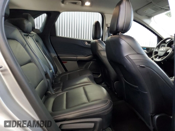 2021 Ford Escape Titanium Plug-In Hybrid z VIN 1FMCU0LZ8MUA66995, wystawiony jako Copart lot #60986765 z przebiegiem 69 609 mil mil oraz Czysty tytuł • Clean title. Historia ofert i sprzedaży dostępna na DreamBid. Obrazek 11.