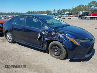 2022 Toyota Corolla LE with VIN 5YFEPMAE8NP320053, listed as a IAAI auction lot 42020183 with 6,673 mi miles and . Bid and sale history available at carsss.com. Image 1.