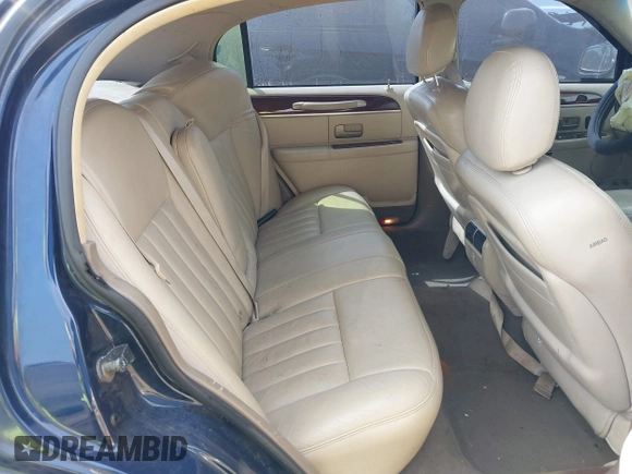 2003 Lincoln Town Car Executive z VIN 1LNHM81W43Y632820, wystawiony jako IAAI lot #42048881 z przebiegiem 137 738 mil mil oraz . Historia ofert i sprzedaży dostępna na DreamBid. Obrazek 8.