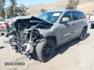2020 Jeep Grand Cherokee Laredo E with VIN 1C4RJEAG3LC247027, listed as a IAAI auction lot 42538279 with 97,601 mi miles and . Bid and sale history available at DreamBid. Image 17.