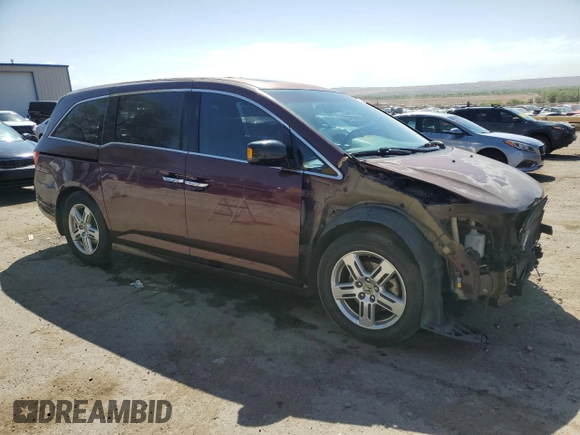 2012 Honda Odyssey Touring with VIN 5FNRL5H90CB076810, listed as a Copart auction lot 53124915 with 178,316 mi miles and Salvage Title. Bid and sale history available at DreamBid. Image 4.