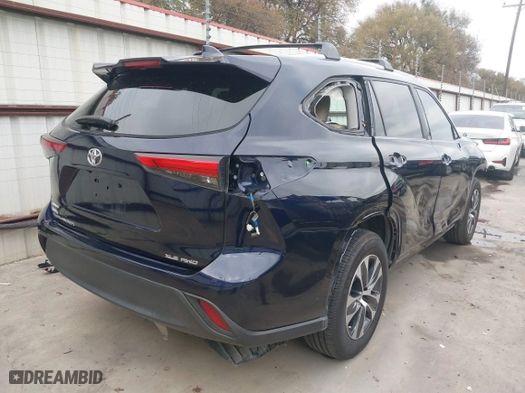 2023 Toyota Highlander L with VIN 5TDKDRBH7PS012979, listed as a IAAI auction lot 40931385 with 69,613 mi miles. Bid and sale history available at carsss.com. Image 4.