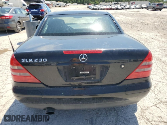 1999 Mercedes-Benz SLK-Class with VIN WDBKK47F5XF129037, listed as a Copart auction lot 68842504 with 74,397 mi miles and Salvage Title. Bid and sale history available at carsss.com. Image 6.