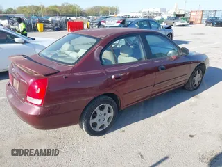 2001 Hyundai Elantra GLS z VIN KMHDN45DX1U085019, wystawiony jako IAAI lot #42045813 z przebiegiem 240 444 mil mil oraz . Historia ofert i sprzedaży dostępna na DreamBid. Obrazek 4.